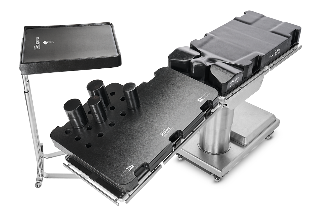 Precision metalworking setup with a chuck and fixture on a workbench.