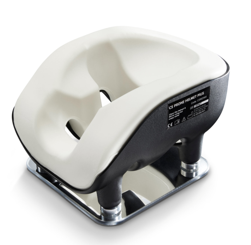 A white and black two-hole paper puncher.