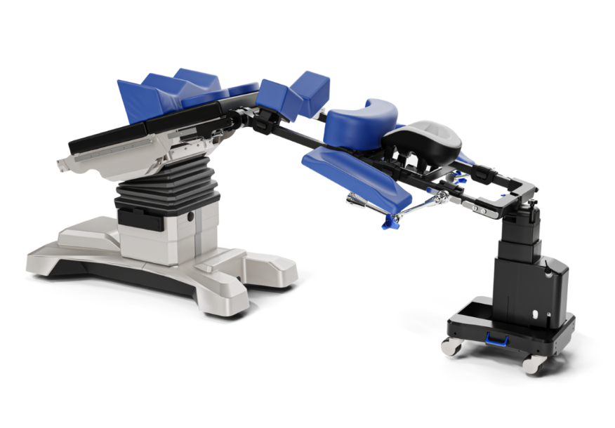 Advanced robotic surgical system with precision instruments and monitor.