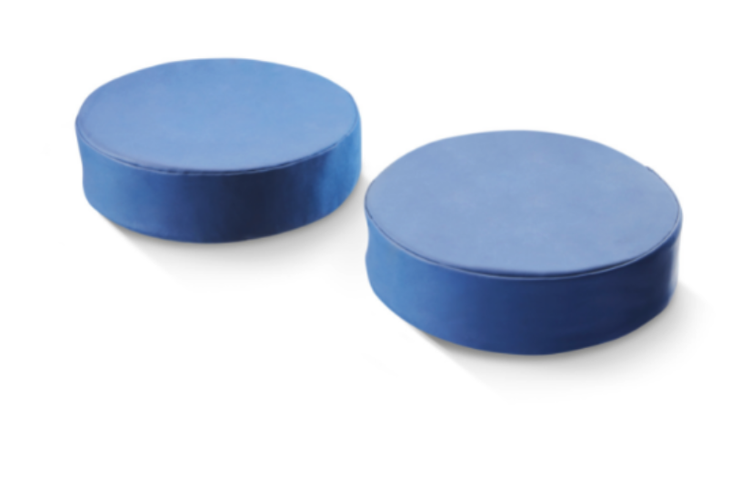 Two blue hockey pucks on a white background.