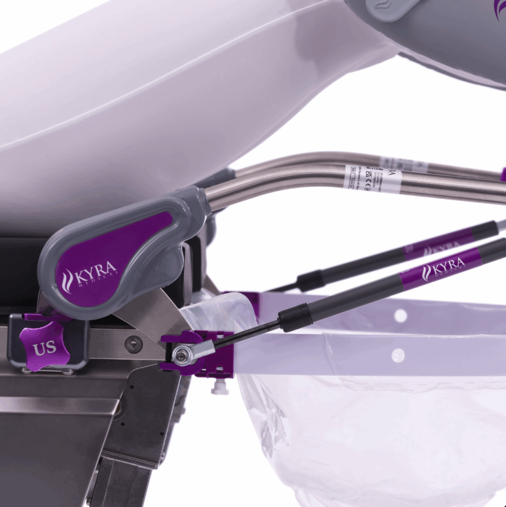 Close-up of a purple and gray baby stroller mechanism with adjustable parts.