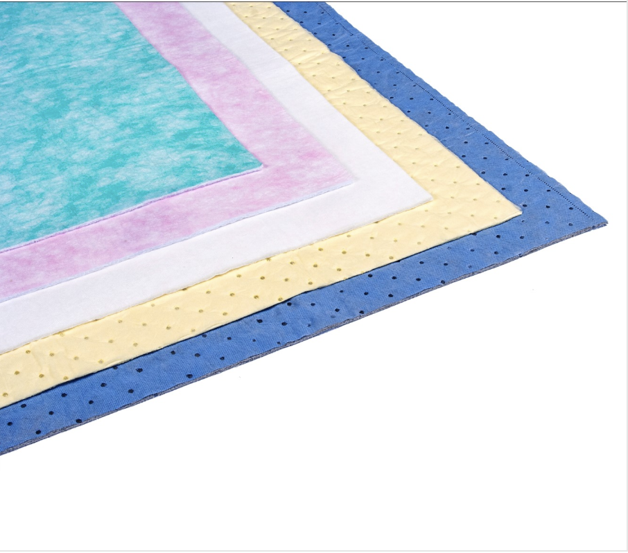 Stack of colorful, textured papers with a speckled pattern.