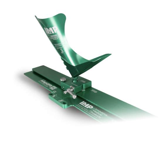 A green circuit board with a flexible ribbon cable attached.