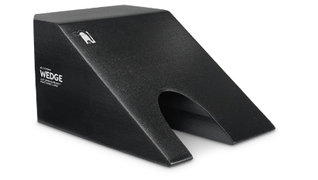 Black ergonomic footrest with angled design and arch support.