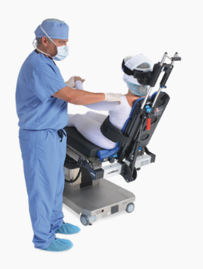 Surgeon preparing a patient for eye surgery using advanced equipment.