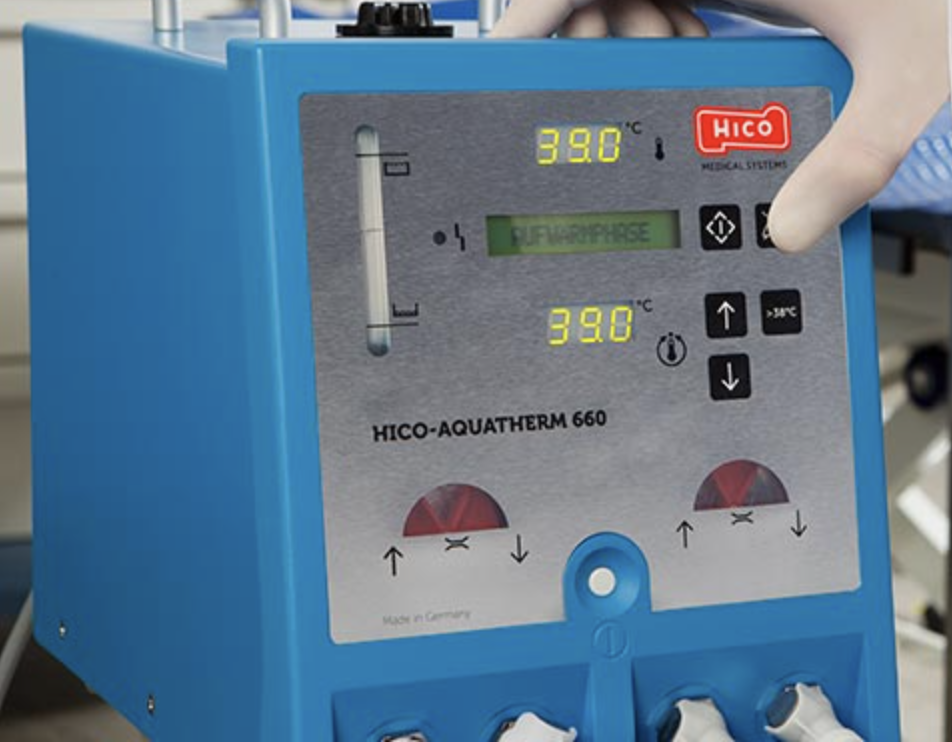Digital meter showing temperature and readings on a blue device.