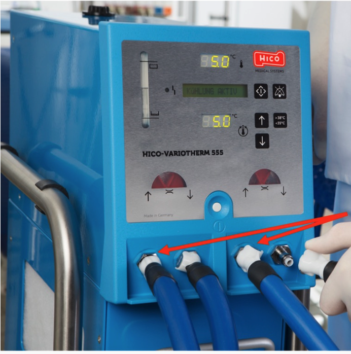 Close-up of a medical device with digital display and gauges.