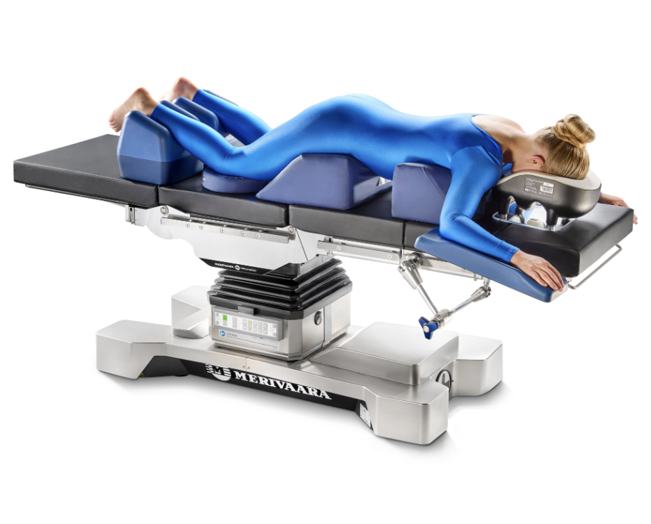 Person lying on a medical examination table.