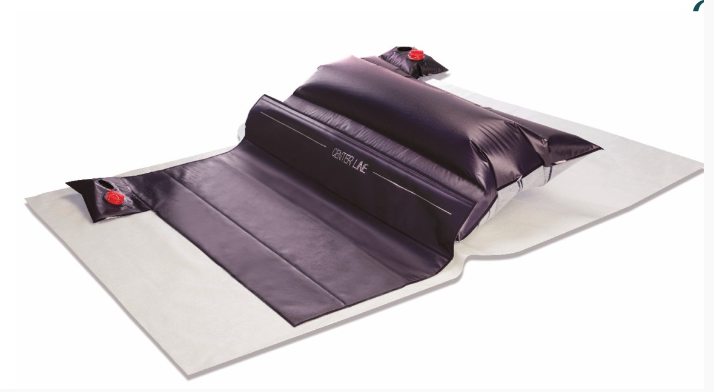 Black inflatable mattress with integrated pump on white background.